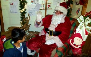 Ludoo cautiously meets Santa..